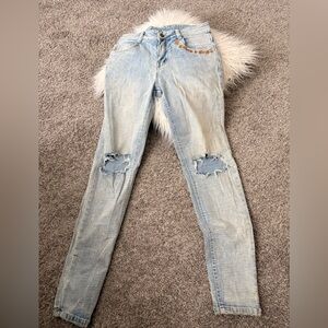 Vintage Women's Light Blue Skinny Distressed Jeans